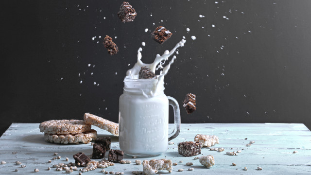 Milk cookies falling sugar nuts free wallpaper - medium preview image
