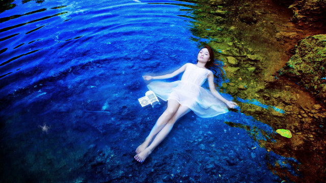 Woman floating water bag surreal free wallpaper - medium preview image
