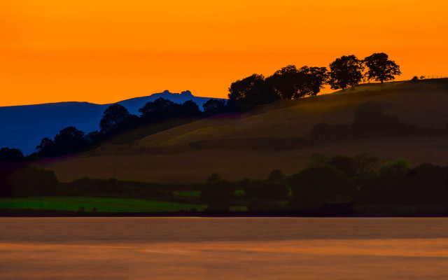 Lone boat sunset mountain yellow free wallpaper - medium preview image