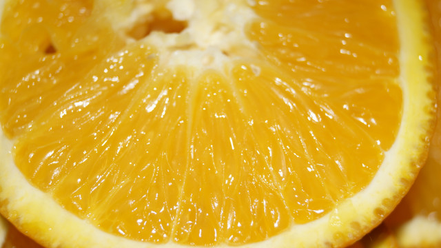 Orange slice water droplets macro free wallpaper - medium preview image