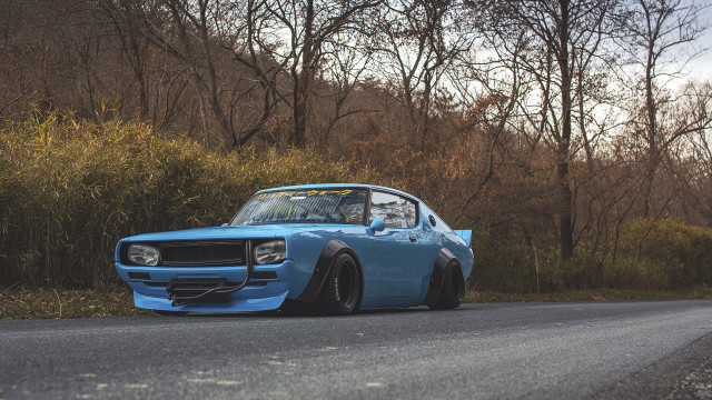 Blue car forest autumn leaves free wallpaper - medium preview image