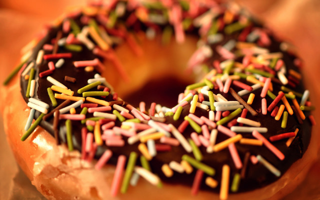 Chocolate donut sprinkles bite hyperrealism free wallpaper - medium preview image