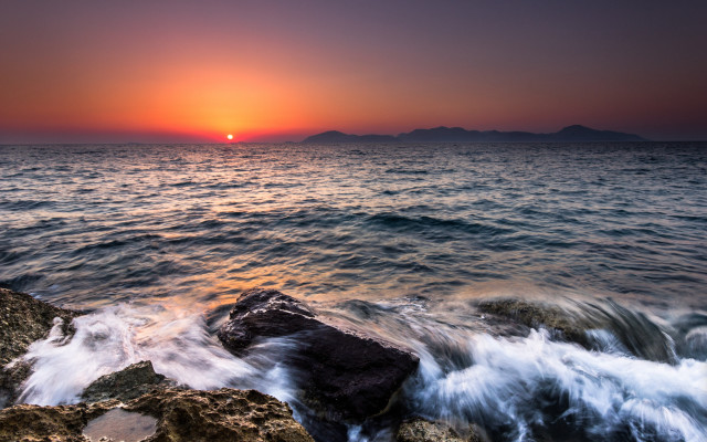 Sunset ocean rock island clouds free wallpaper - medium preview image