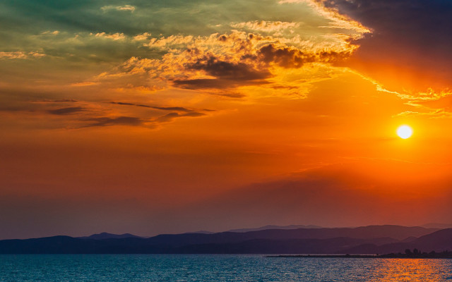 Sunset water mountains boat clouds free wallpaper - medium preview image