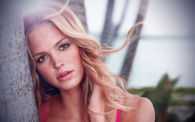 Woman leaning tree blonde blurry free wallpaper - medium preview image