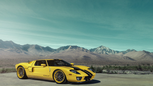 Yellow sports car mountain scape free wallpaper - medium preview image