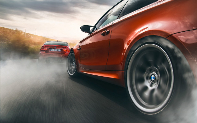 Red car driving tiltshift motion free wallpaper - medium preview image
