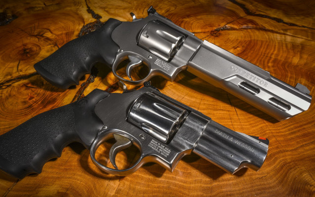 Revolvers wooden table silver grips free wallpaper - medium preview image