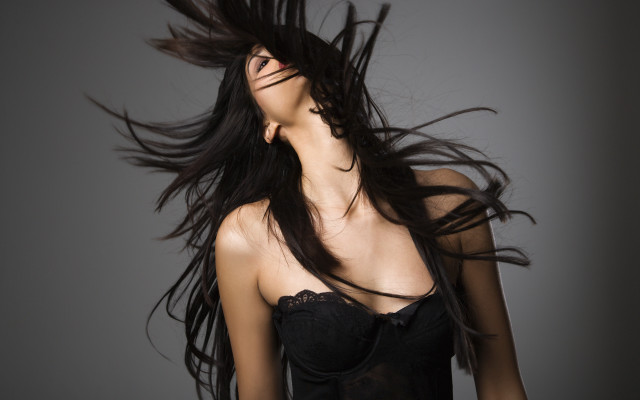 Woman blowing hair black dress #2 free wallpaper - medium preview image
