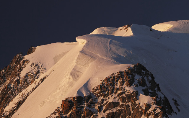 Snowy mountain peak rocks desert free wallpaper - medium preview image