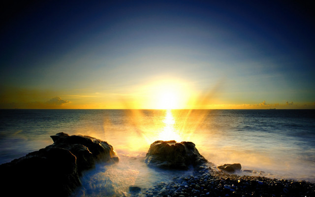 Sunset ocean rocks sky light free wallpaper - medium preview image