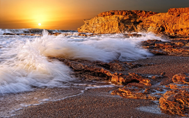 Wave shore sunset rock formation free wallpaper - medium preview image