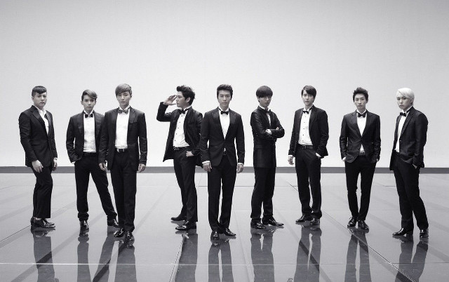 Men in suits standing formal free wallpaper - medium preview image
