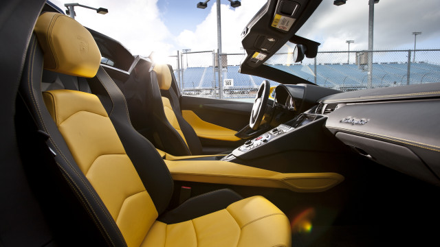 Car yellow black seats sky free wallpaper - medium preview image
