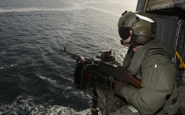 Military man boat water gun free wallpaper - medium preview image