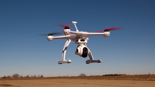 White black drone flying blue free wallpaper - medium preview image