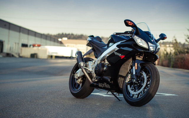 Motorcycle road building trees photorealism free wallpaper for desktop - medium preview image