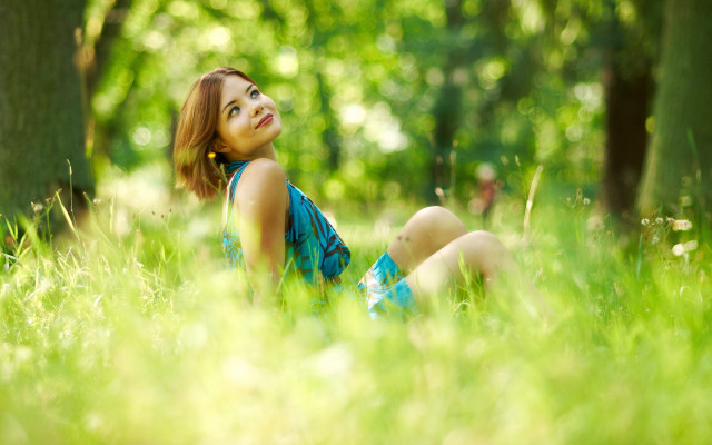 Woman sitting grass park sky free wallpaper - medium preview image