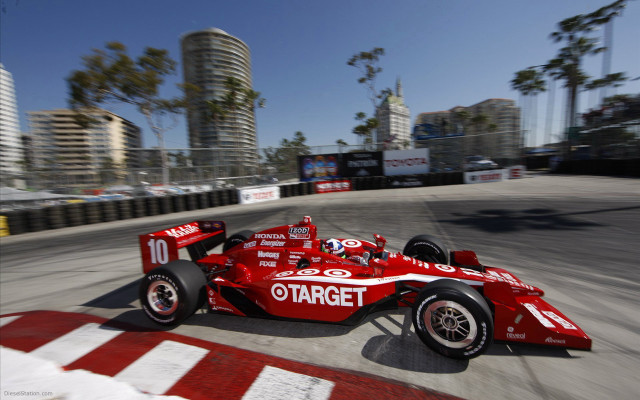Red race car cityscape tiltshift free wallpaper - medium preview image