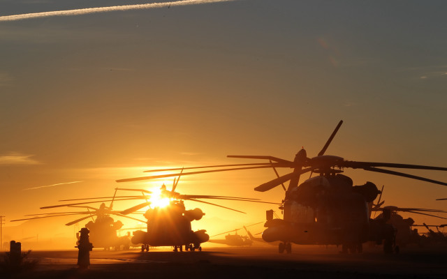Military helicopters sunset contrails backlit free wallpaper - medium preview image