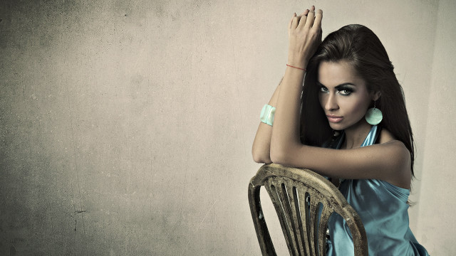 Woman blue dress leaning chair #2 free wallpaper - medium preview image