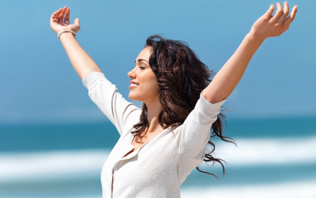 Woman arms up beach blue free wallpaper - medium preview image