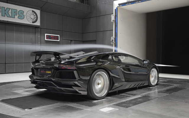 Black sports car watering tires free wallpaper - medium preview image