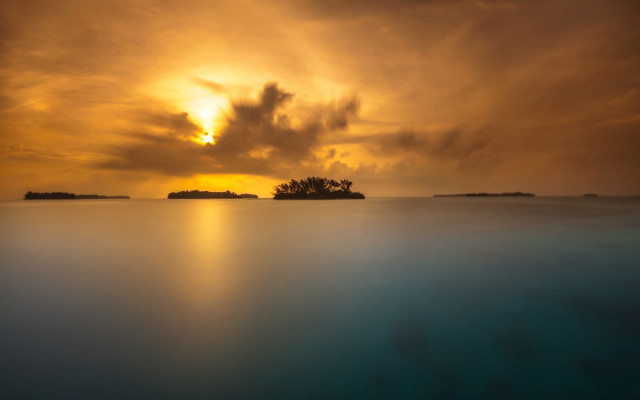 Sunset water island clouds mountains free wallpaper - medium preview image