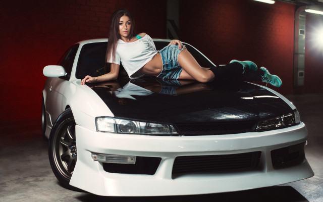 Woman car garage denim shorts free wallpaper - medium preview image
