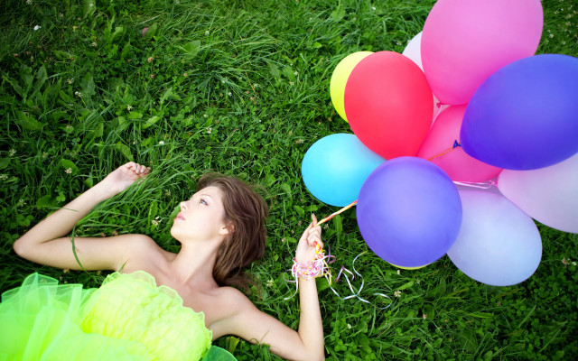 Woman balloons grass outdoors nature free wallpaper - medium preview image