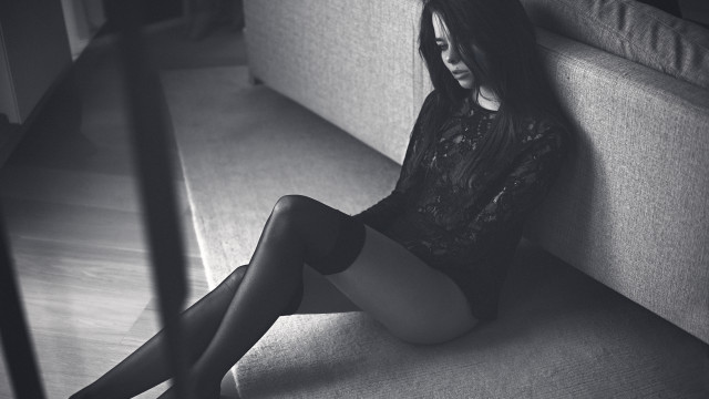 Woman sitting crossed legs black #2 free wallpaper - medium preview image