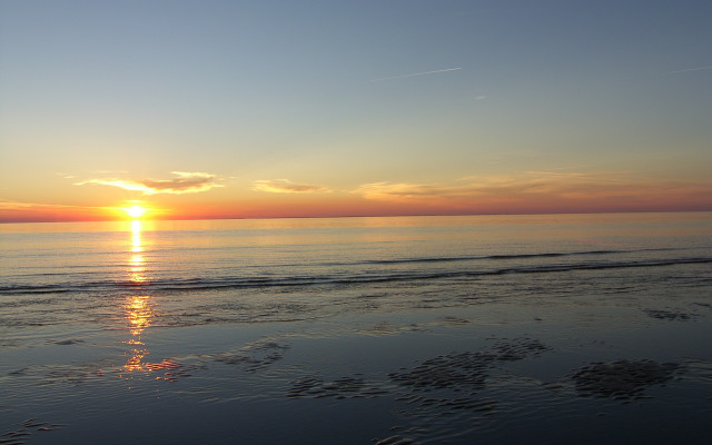 Sunset ocean beach surfboard mountain free wallpaper - medium preview image