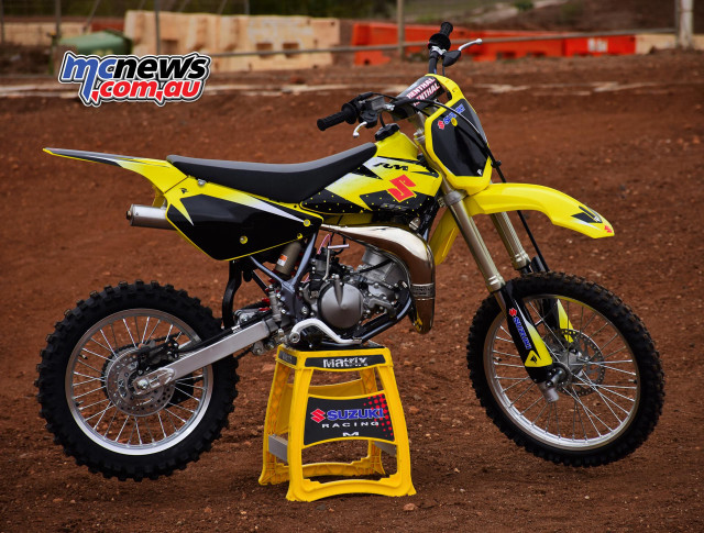 Yellow dirt bike stand dirt free wallpaper - medium preview image