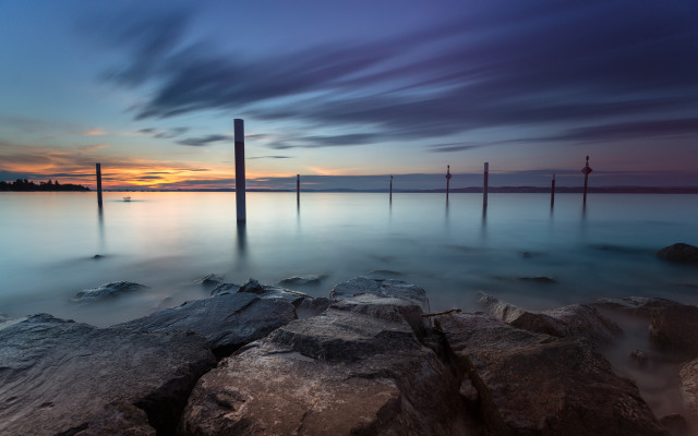 Sunset water mountains rocks boat free wallpaper - medium preview image
