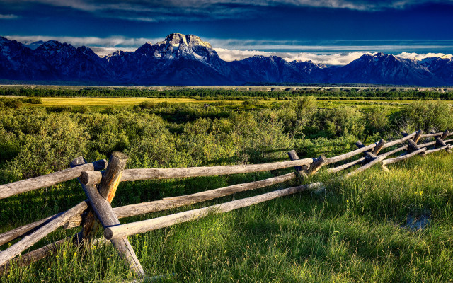 Wooden fence grassy mountains clouds free wallpaper - medium preview image