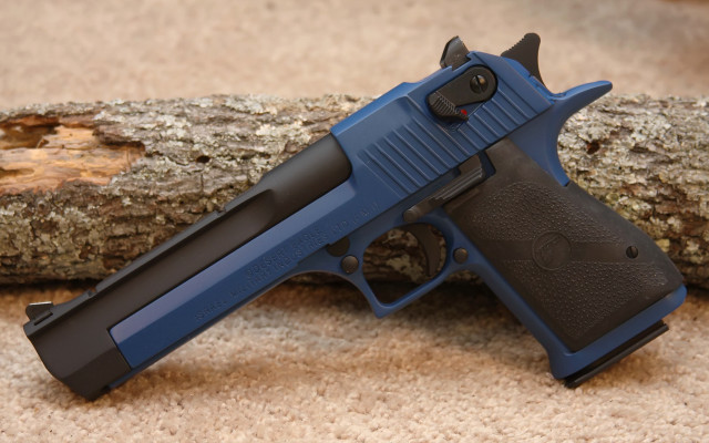 Blue gun brown carpet tree free wallpaper - medium preview image