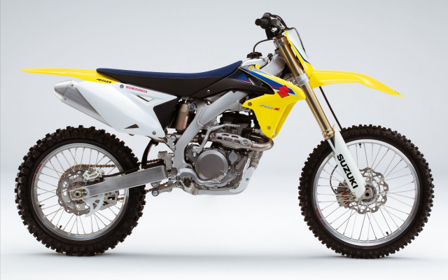 Yellow dirt bike white floor free wallpaper - medium preview image