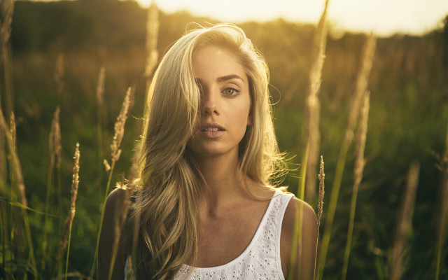 Blonde woman field blowing hair #2 free wallpaper - medium preview image