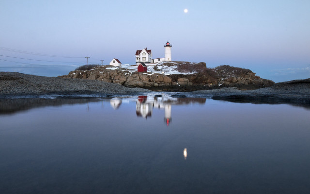 Lighthouse rocky shore fullmoon water free wallpaper - medium preview image