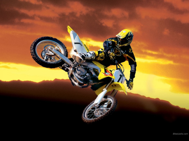Man motorcycle air sunset clouds free wallpaper - medium preview image