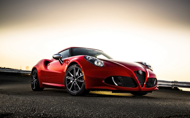 Red sports car bridge sunset free wallpaper - medium preview image