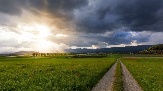 Dirt road field sunbeam clouds free wallpaper - medium preview image