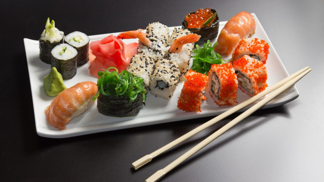 Sushi plate chopsticks black background free wallpaper - medium preview image