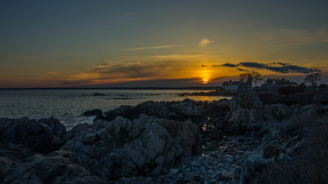 Sunset rocky shore lighthouse water free wallpaper - medium preview image