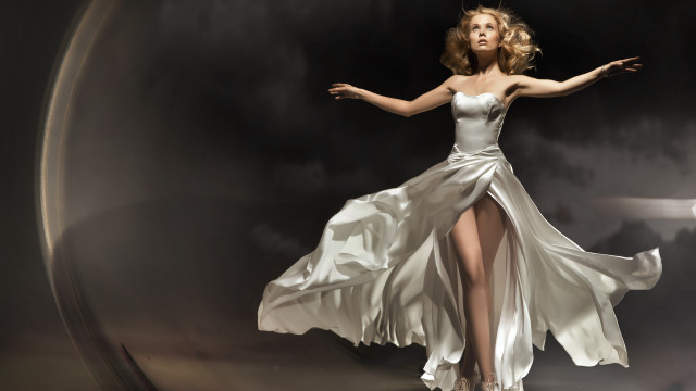 Woman white dress outstretched pose free wallpaper - medium preview image