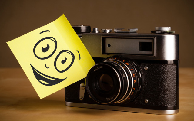 Camera smiley yellow sticker art free wallpaper - medium preview image