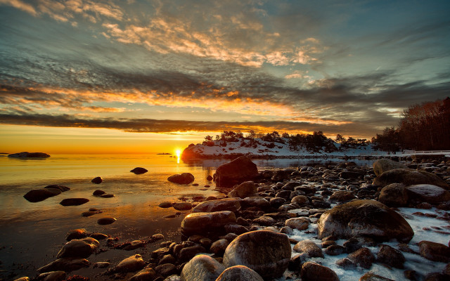 Sunset rocky beach boat snow free wallpaper - medium preview image