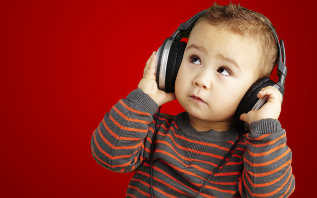 Young boy headphones listening music free wallpaper - medium preview image