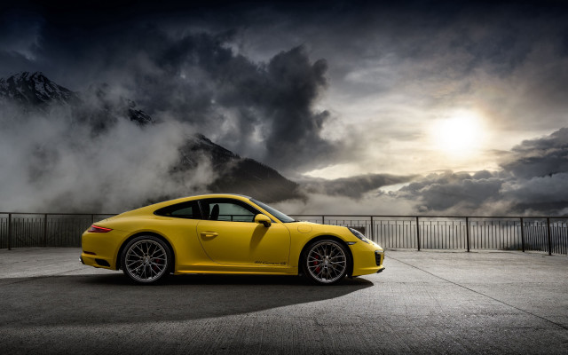 Yellow sports car mountain cloudy free wallpaper for desktop - medium preview image