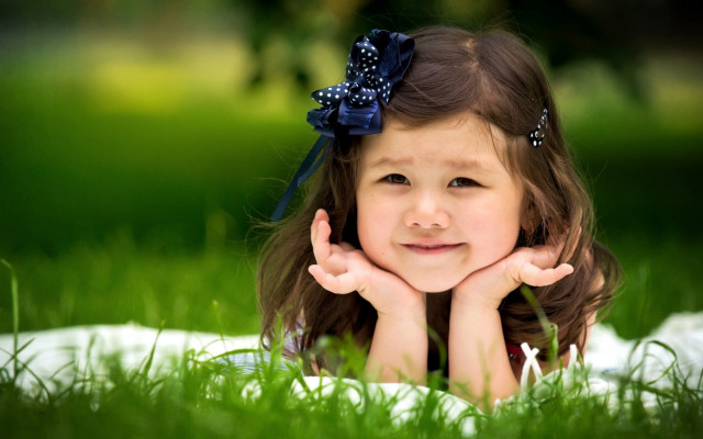 Little girl blanket grass smiling free wallpaper - medium preview image
